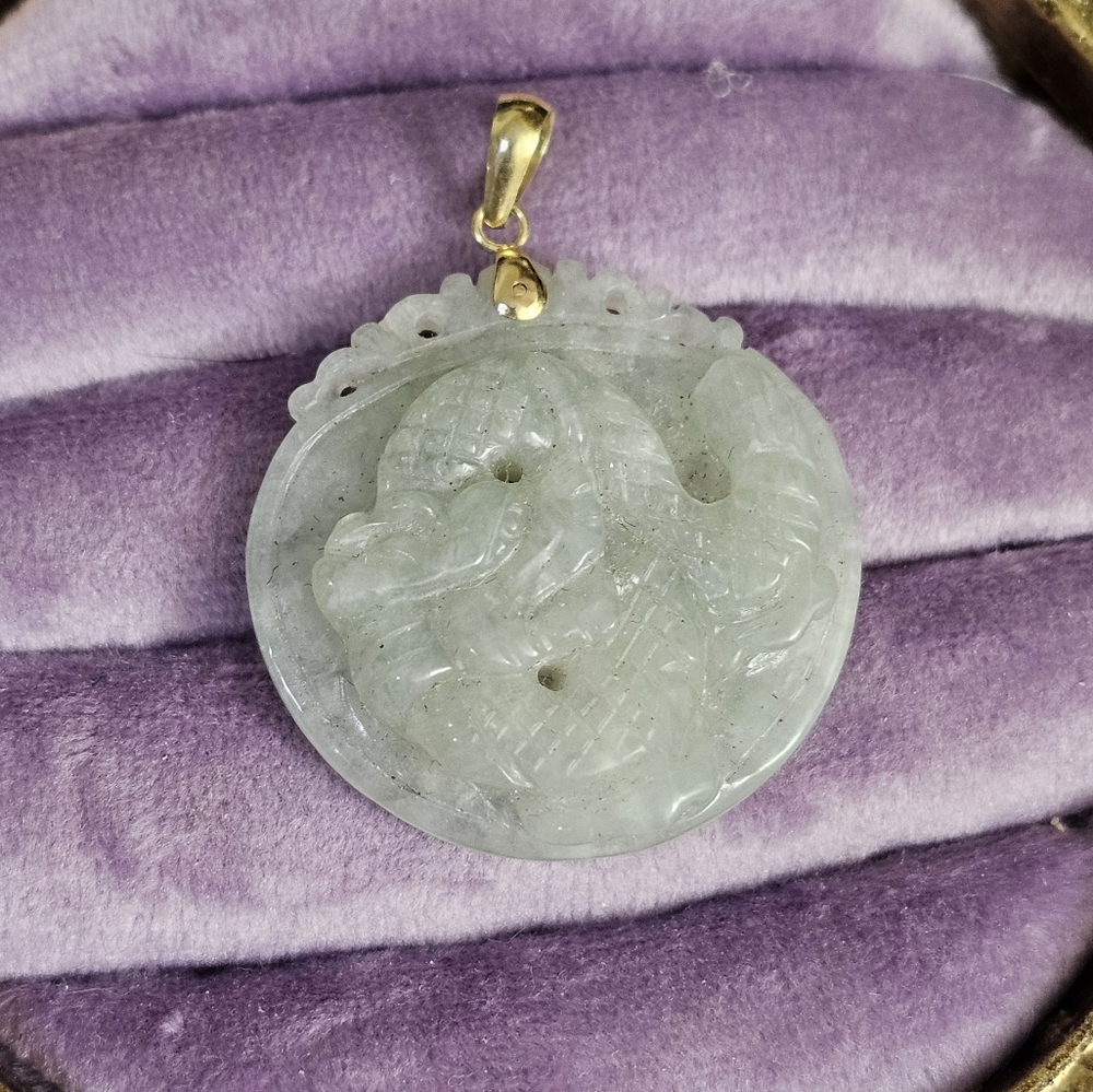 14k genuine jade pendant. Stamped 14k Hong Kong. See all pics for more info!S